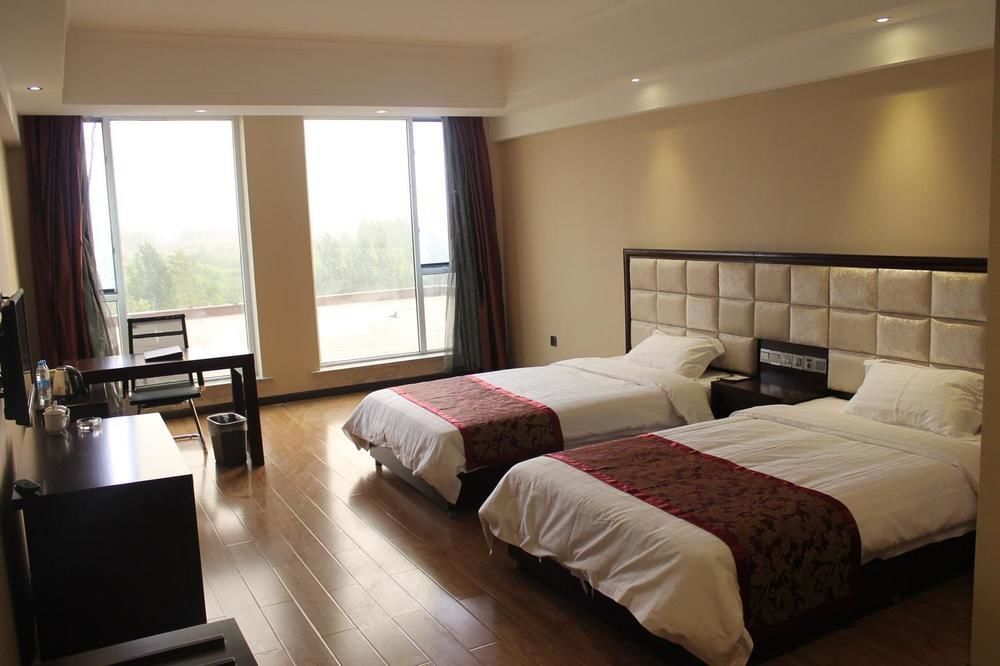 Weishi International Hotel Qing Zhou Exterior foto